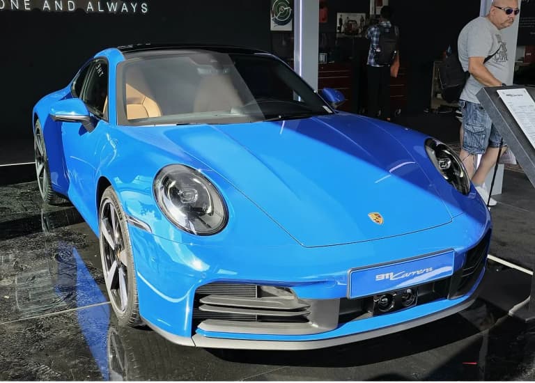 Blue Porsche 992 Carrera front view