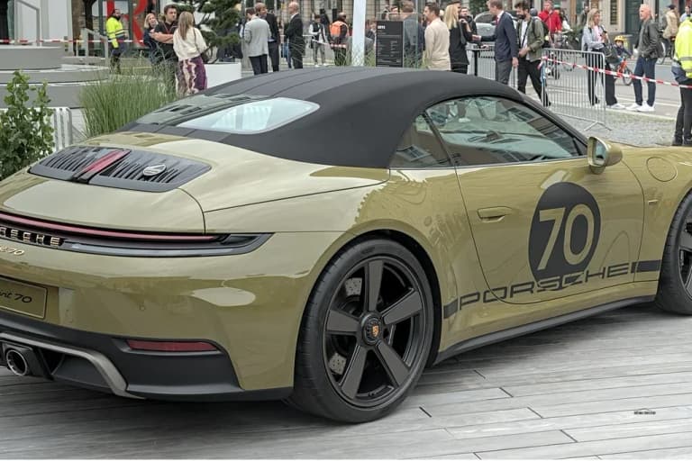 Blue Porsche 992 Carrera GTS parked on display