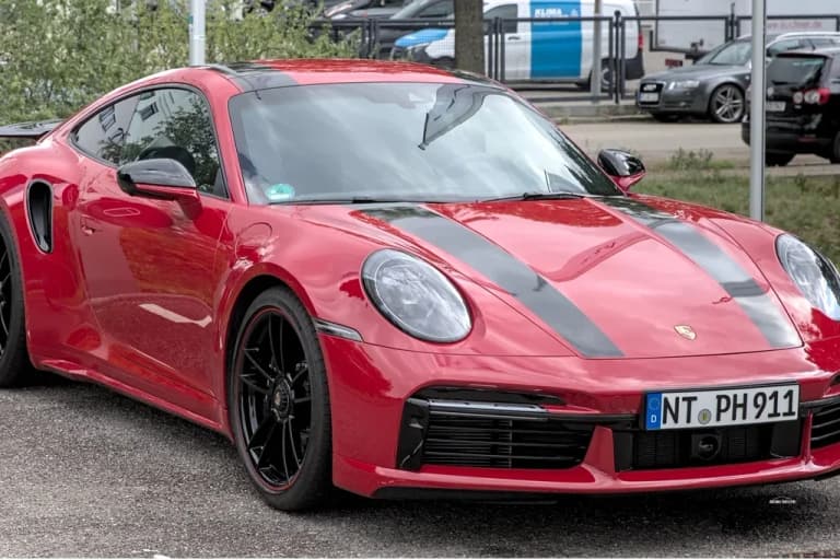 Black Porsche 992 Turbo S from the side
