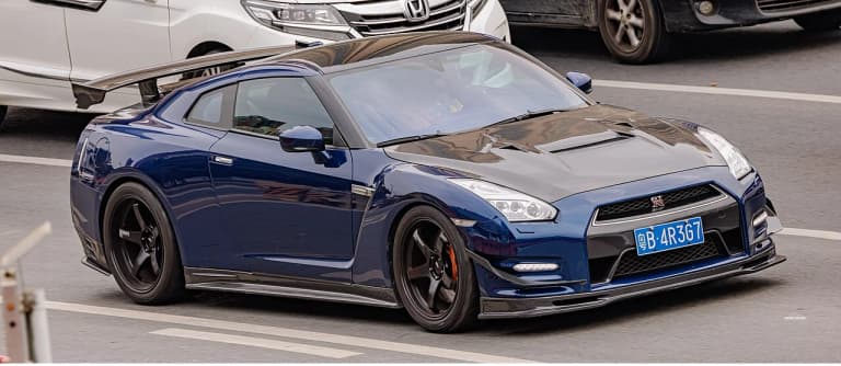 Black Nissan GT-R R35 parked on the street