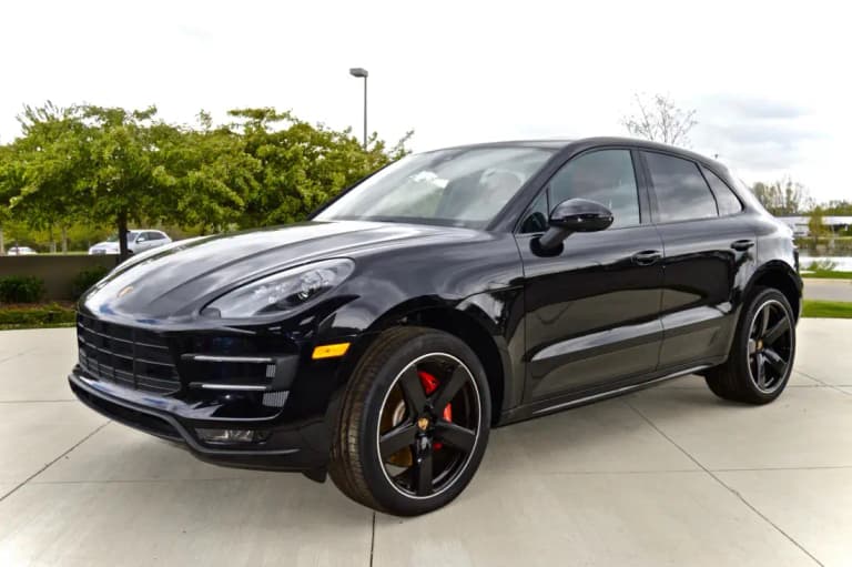 Black Porsche Macan Turbo, front three-quarter view