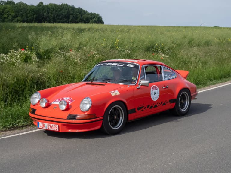 Porsche 911 Carrera RS 2.7 on a country road