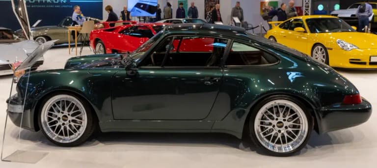 Dark green Porsche 964 911 with polished BBS wheels, side profile