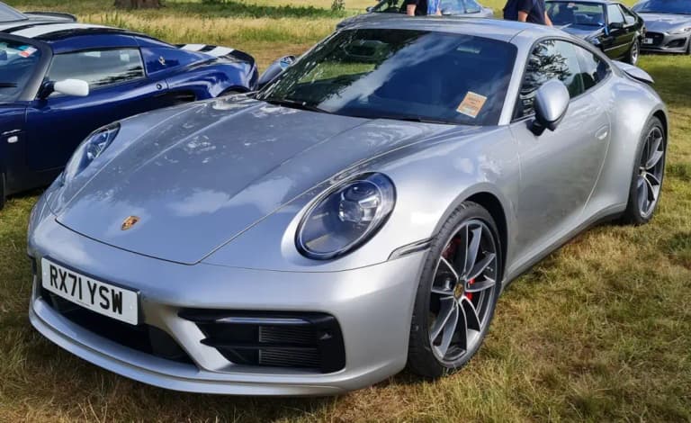 Silver Porsche 992 911 Carrera S, front three-quarter view