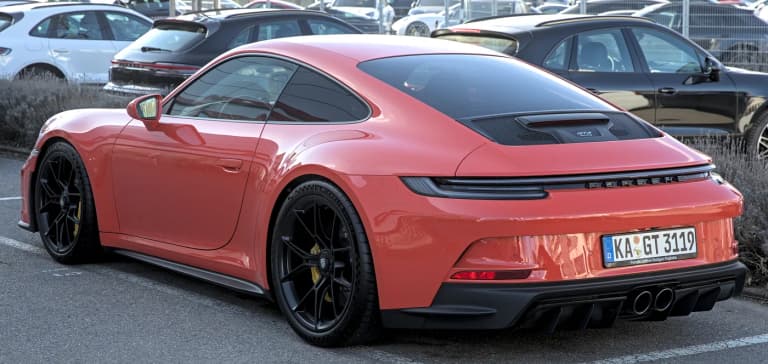 Red Porsche 911 (992) GT3 Touring, rear view
