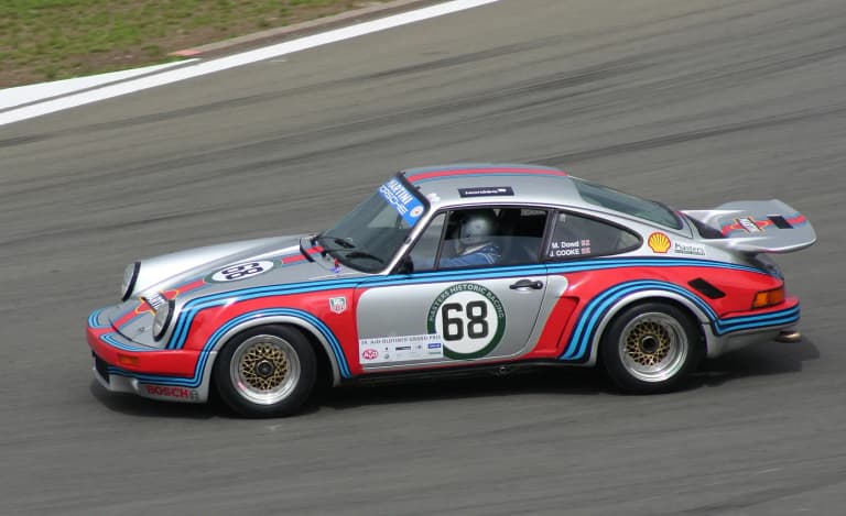 Porsche 911 Carrera RSR racing in Martini livery