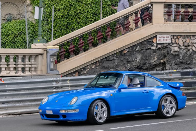 Blue Porsche 911 (993) Turbo with fixed rear wing