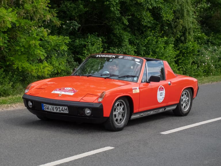 Side profile of a Porsche 914 showing its low, wedge-shaped body