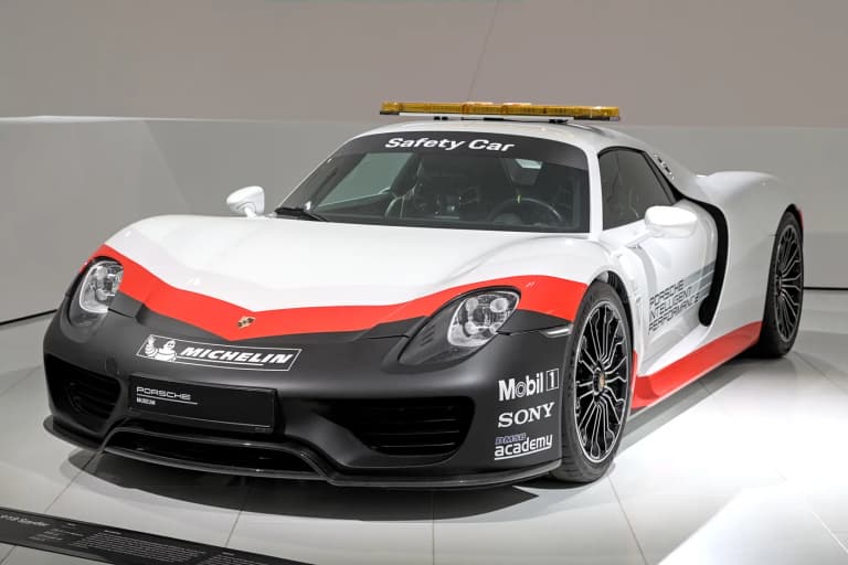 Porsche 918 Spyder in safety car livery on display at the Porsche Museum