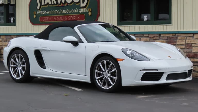 Red 2018 Porsche 718 Boxster front three-quarter view