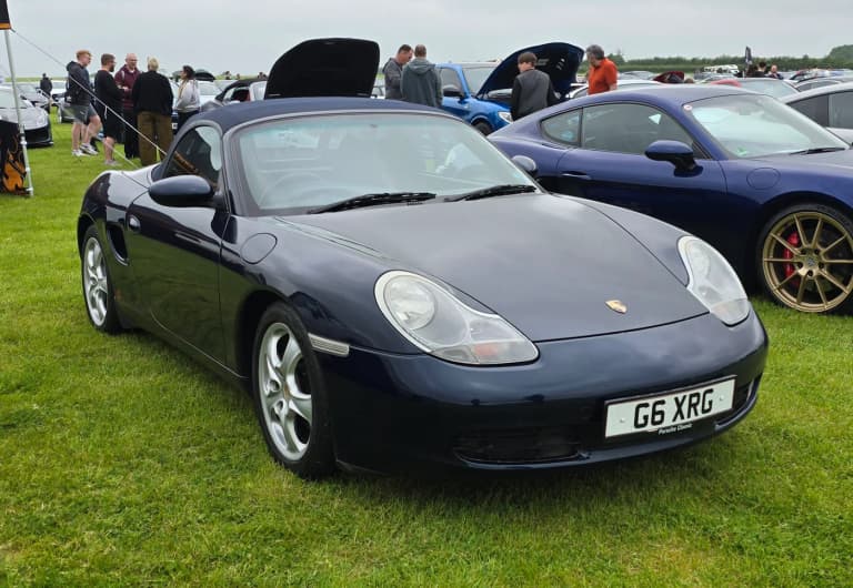Silver 2000 Porsche Boxster 986 at a car show in England