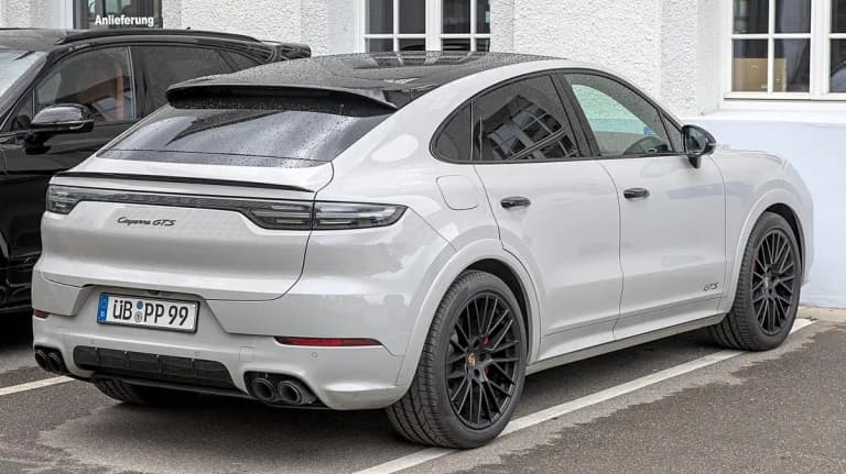 Grey Porsche Cayenne GTS Coupe, rear three-quarter view