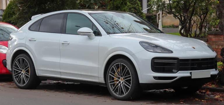 White Porsche Cayenne Coupe Turbo, front three-quarter view