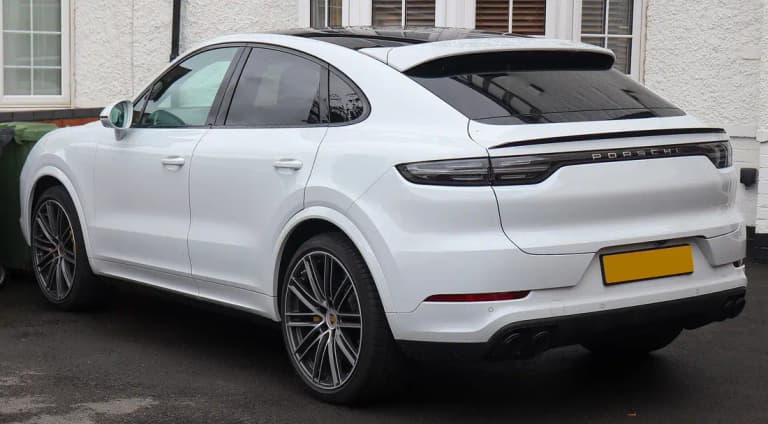 White Porsche Cayenne Coupe Turbo showing the sloping fastback roofline
