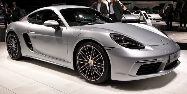 Rear view of a Porsche 718 Cayman S showing the mid-engine coupe design