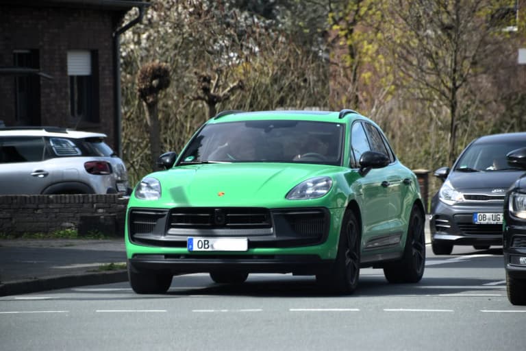 Green Porsche Macan, front three-quarter view