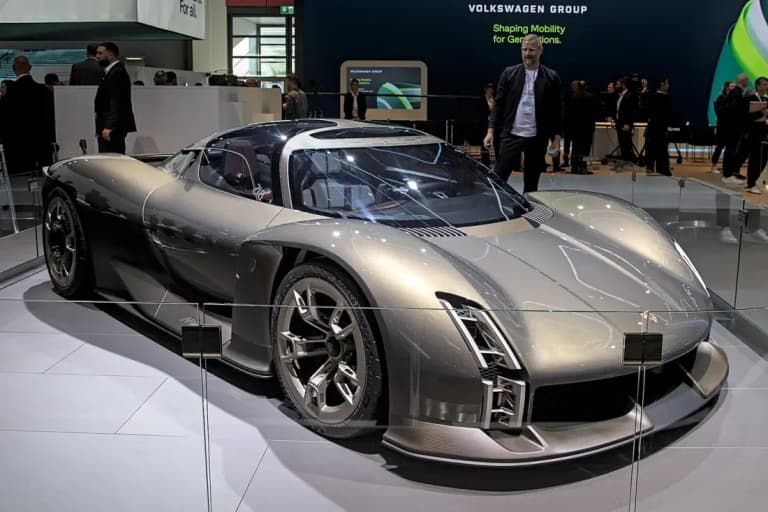 Porsche Mission X concept hypercar, front three-quarter view, with glass canopy and carbon nose
