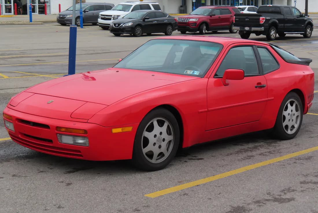 Guards Red 1989 Porsche 944 Turbo viewed from the front left.