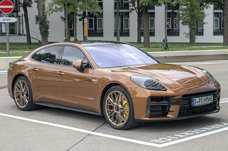 Bronze Porsche Panamera Turbo E-Hybrid, the third-generation 972 car, parked in Stuttgart.