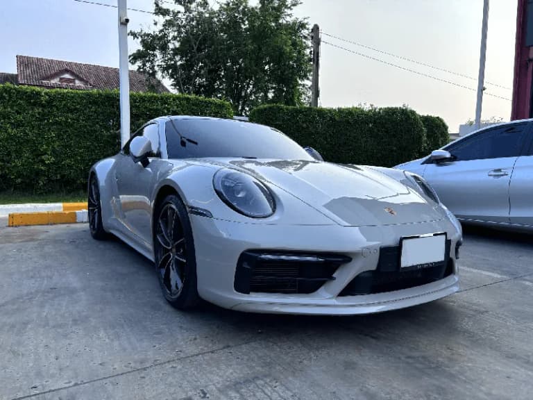 White Porsche 911 from Bangkok's luxury rental market