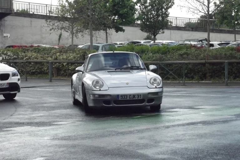 Silver air-cooled Porsche 911 (993)