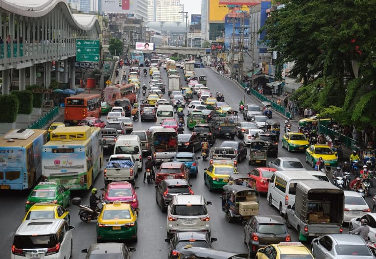 Daytime traffic on a multi-lane Bangkok road