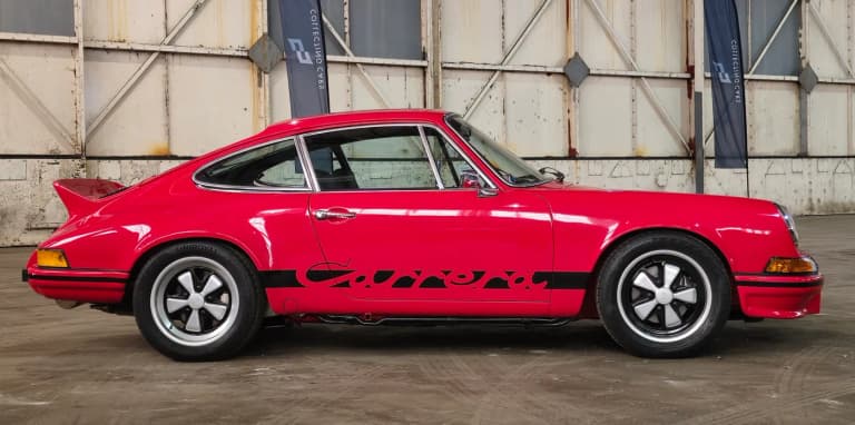 Guards Red Porsche 911 Carrera, side view