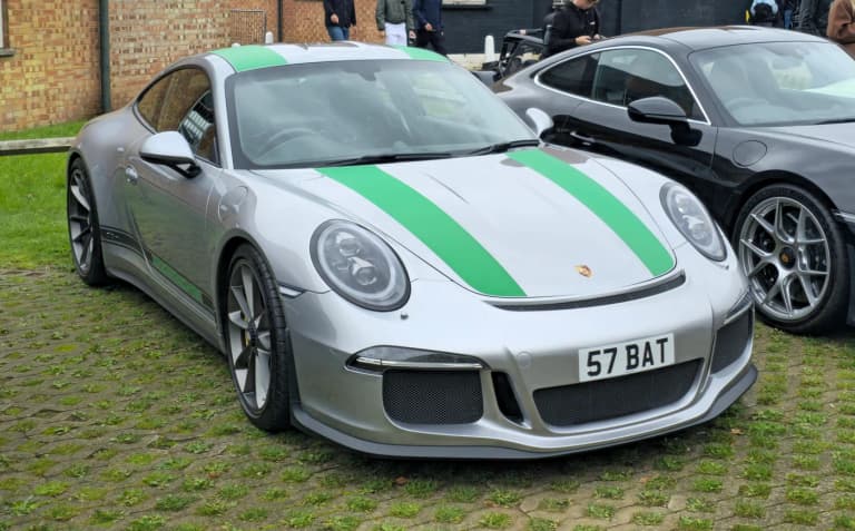 Silver Porsche 911 R with green stripes