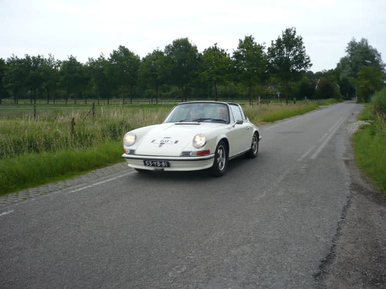 White Porsche 911 long hood Targa on the road