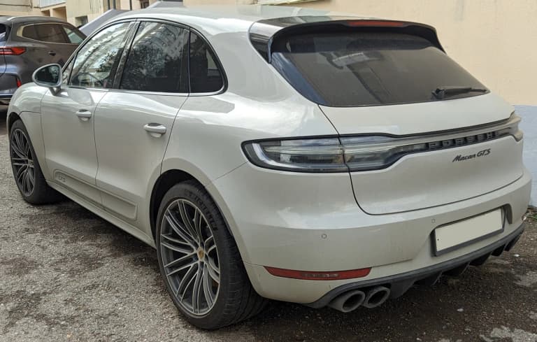 Grey 2020 Porsche Macan GTS shown from the rear three-quarter angle