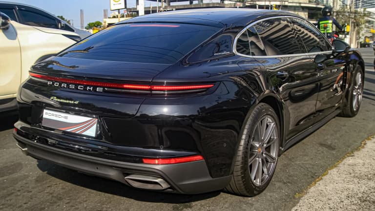 Black third-generation Porsche Panamera 972 Executive rear three-quarter view