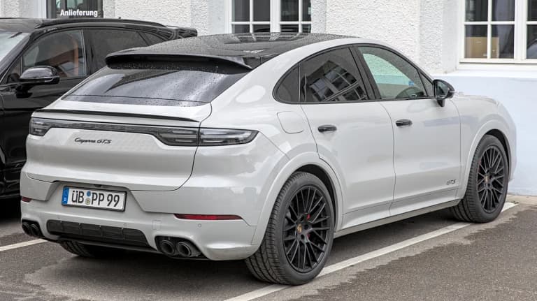 Grey Porsche Cayenne Coupe GTS rear three-quarter view
