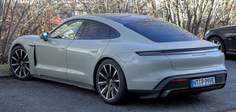 Gray Porsche Taycan GTS sedan, three-quarter view