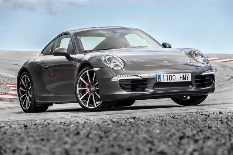 Grey Porsche 991 Carrera 4S on a racetrack