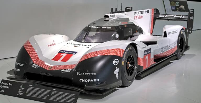 Porsche 919 Hybrid Evo racing prototype on display at the Porsche Museum, front three-quarter view