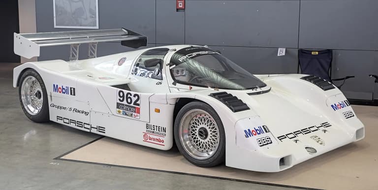 Porsche 956 from 1983 on display, showing the full works bodywork and ground-effect side pods