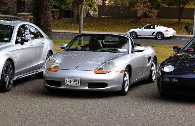 Silver 1999 Porsche 986 Boxster, an early M96-powered example with amber headlamp sections