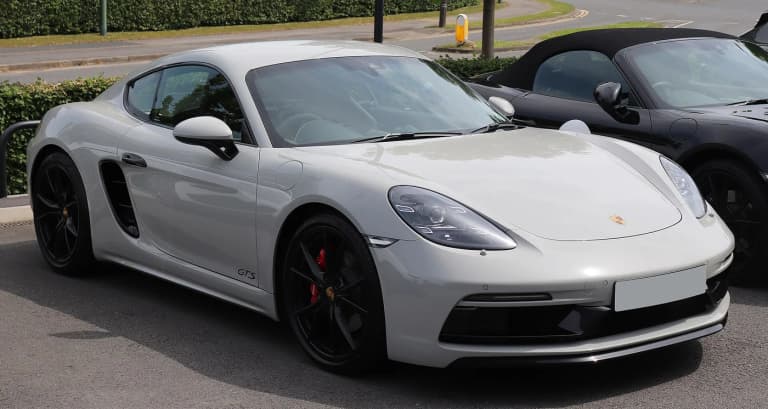 White Porsche 718 GTS 2.5 in front three-quarter view