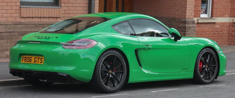 Green 2015 Porsche 981 GTS viewed from the rear
