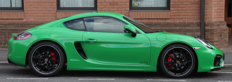 Green 2015 Porsche 981 GTS viewed from the side