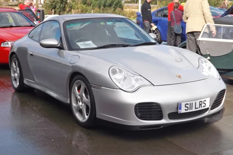 Porsche 996 Carrera coupe, an M96-powered 911 application, parked outdoors