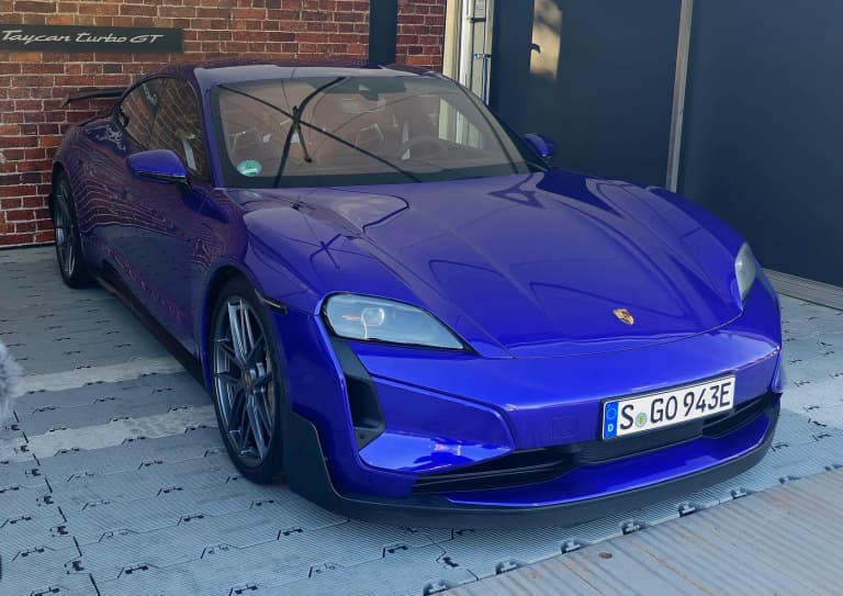 Purple Porsche Taycan Turbo GT with Weissach Package from the front three-quarter angle