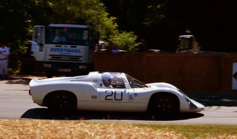White Porsche 910 racing prototype, number 20, at the 2014 Goodwood Festival of Speed
