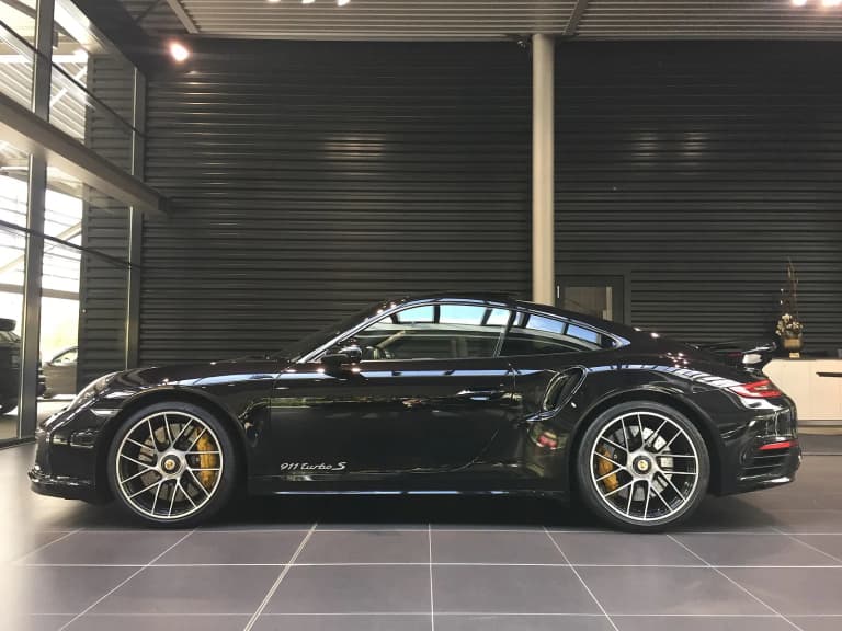 Side view of a standard Porsche 991 Turbo S, the donor car for the Stinger GTR. Not a conversion.
