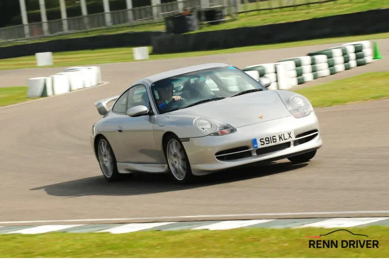 Silver Porsche 996 on the track