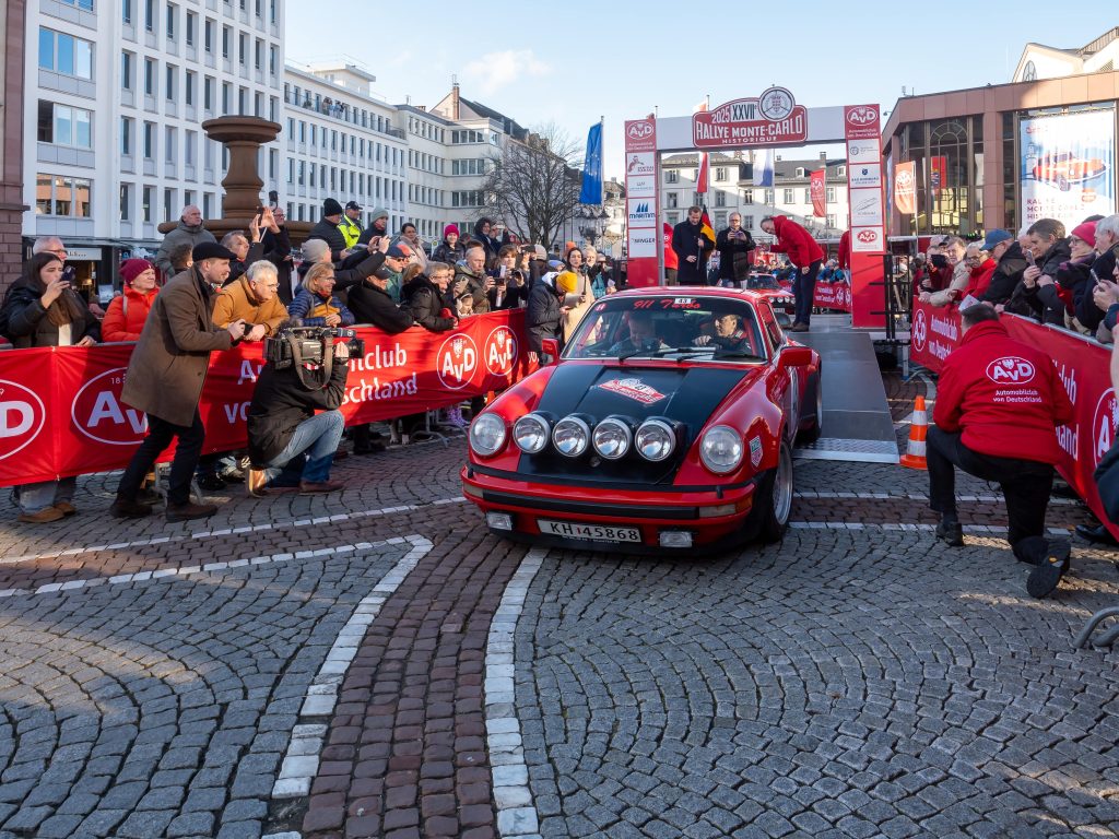 1978 Porsche 911 Turbo (930) in rally livery with rear whale-tail spoiler at a car event
