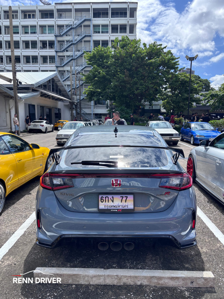 Rear view of grey FL5 Civic Type R with triple center exhaust.