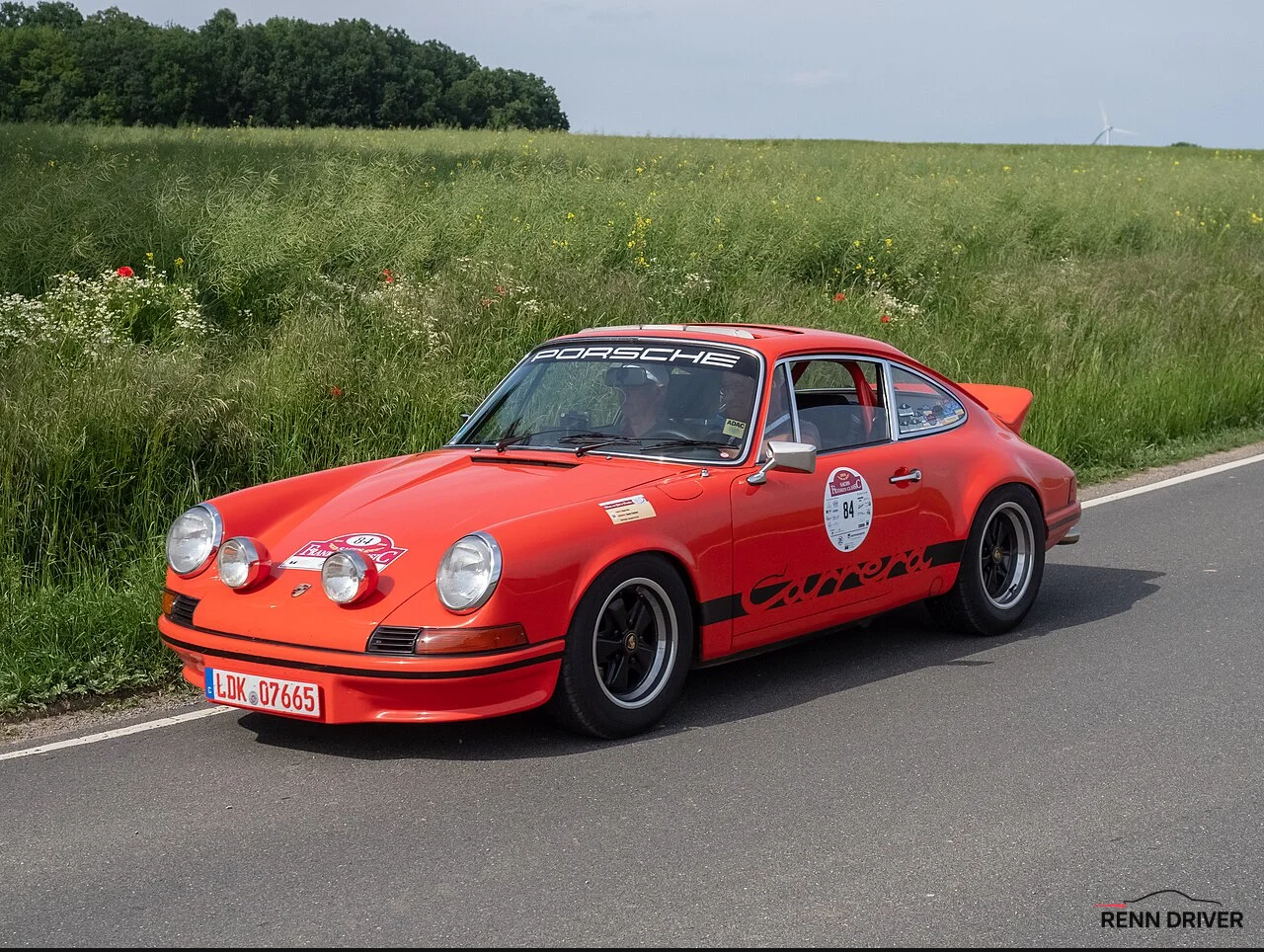 Green Porsche 911 Carrera RS 2.7 with ducktail spoiler