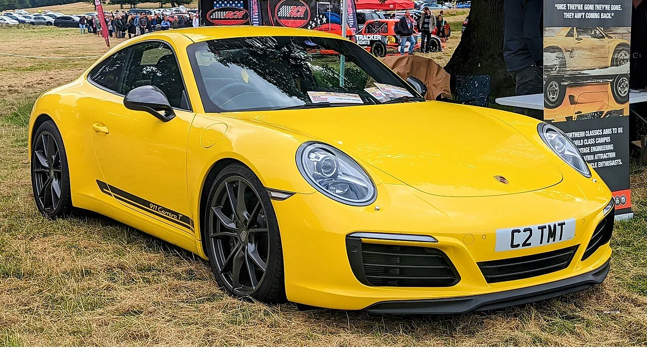Racing Yellow Porsche 991.2 Carrera T front three-quarter view