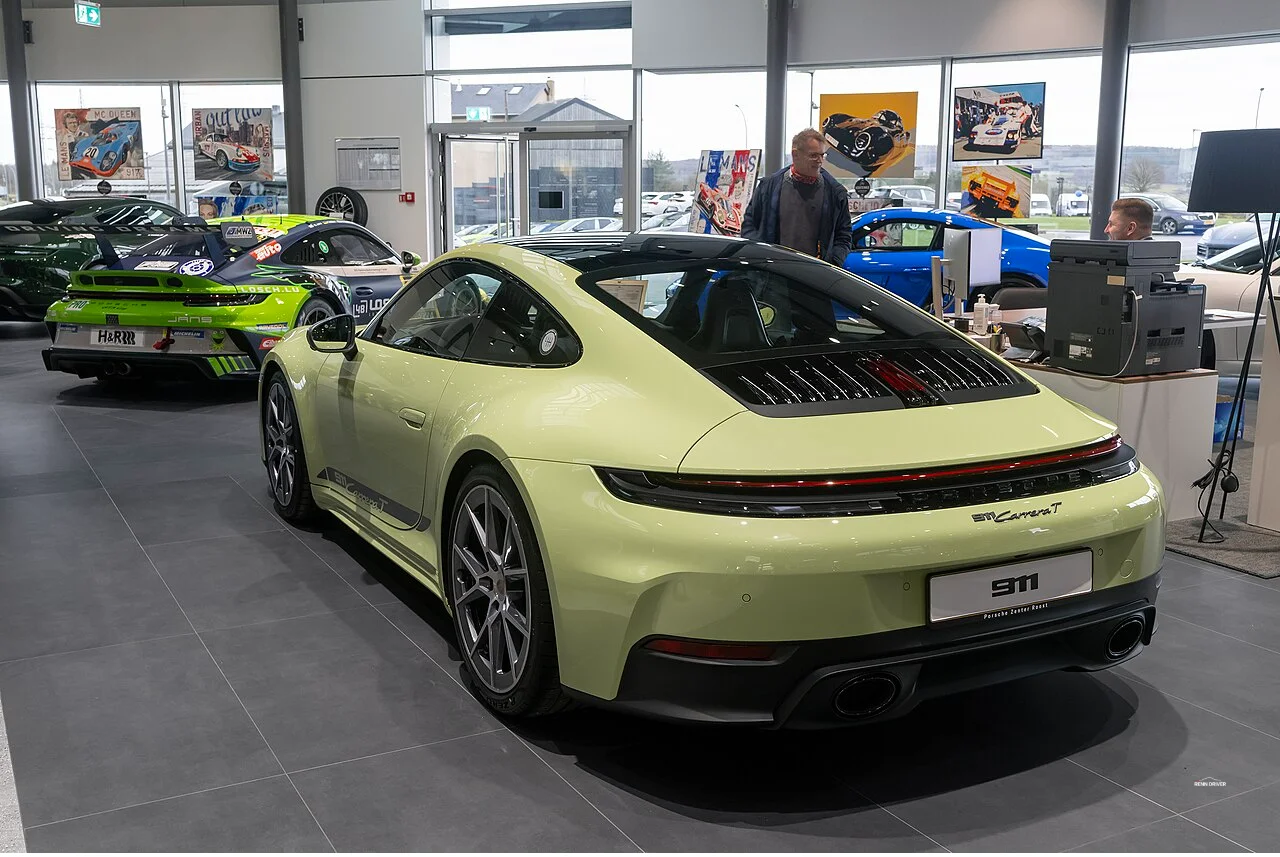 Silver Porsche 992 Carrera T rear three-quarter view